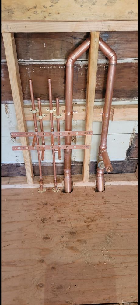 Copper repipe stub-outs roughed in through wall studs